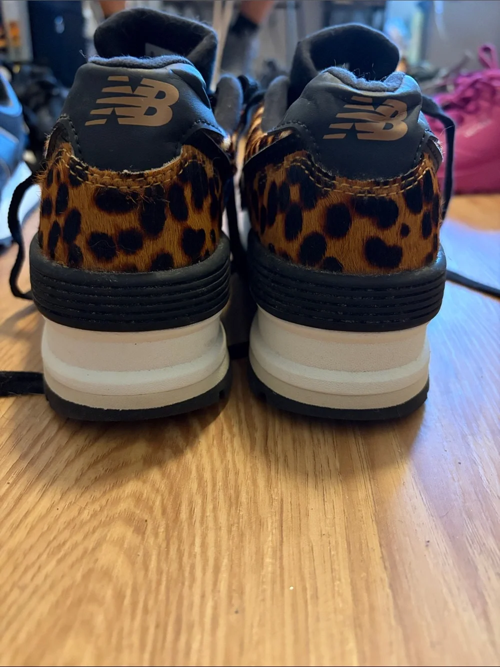 New Balance women’s Leopard-Print Sneakers in Brown and Black